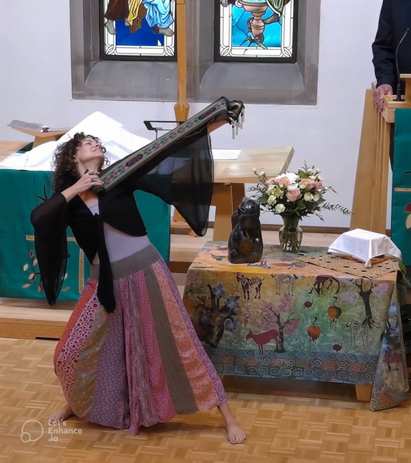 Katharine dancing at her father's funeral service