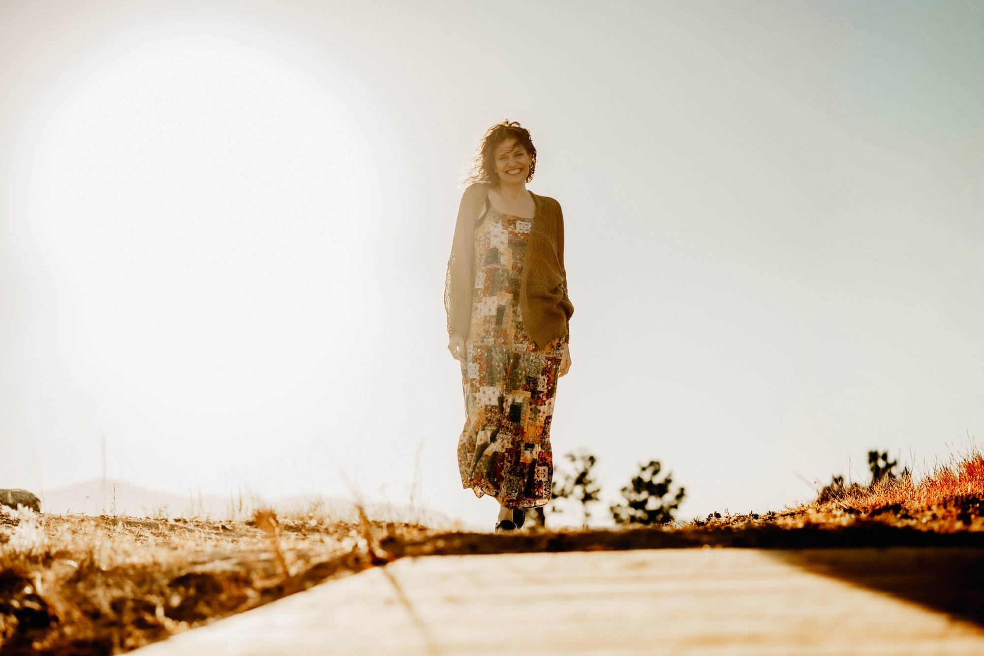 Katharine Zink walking toward camera, golden hour Colorado
